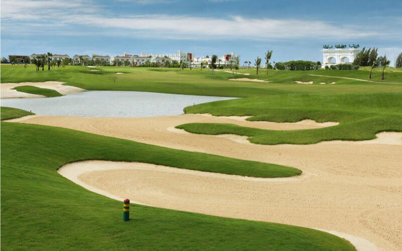 Grand Phnom Penh Golf Club water hazards, and surging greens.