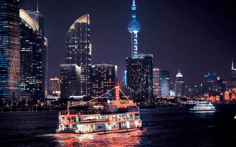 Evening cruise along the Huangpu River with skyline views