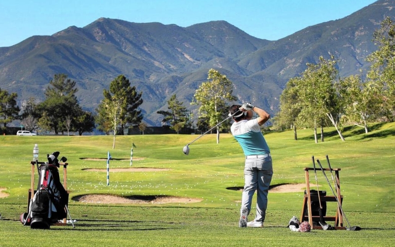 Golfers teeing off at one of China’s premier resort-style courses