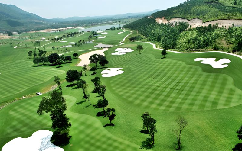 Scenic golf course at Tam Dao nestled in the hills, featuring rolling greens and fresh mountain air.