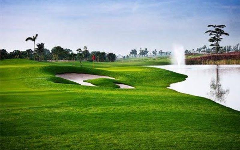 Royale Jakarta Golf Club Indonesia showcasing championship greens, white sand bunkers, scenic water hazards, and beautifully maintained fairways in a tropical setting.
